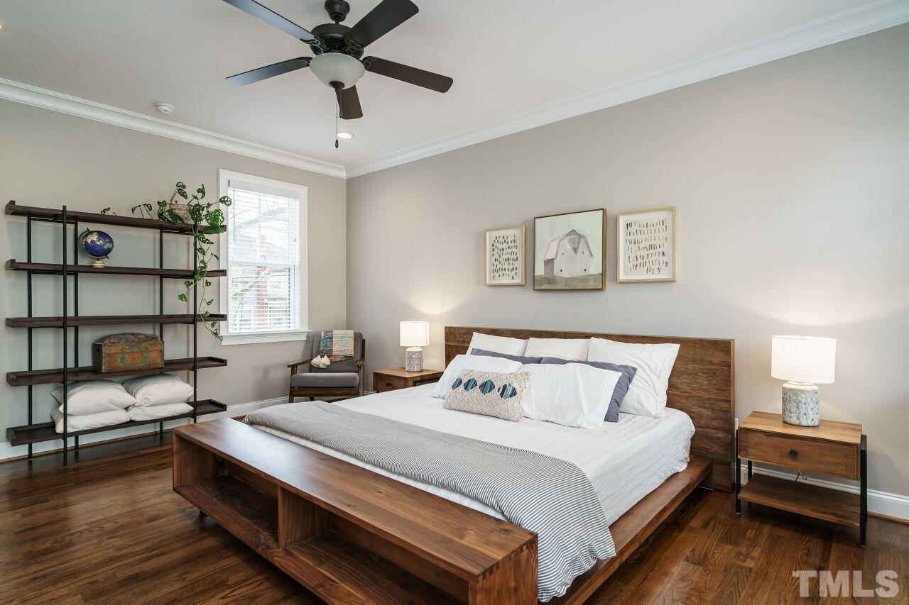 203 Georgetown Road Raleigh, NC 27608 - Photo 10 of 35 a bedroom with a bed and window