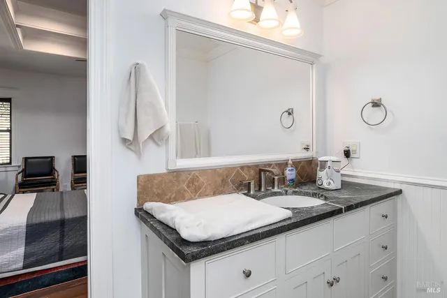 a bathroom with a bathtub and shower