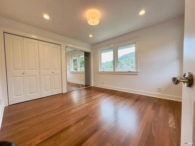 a view of a patio with couches and potted plants