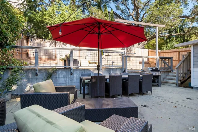 a view of a house with roof deck front of house
