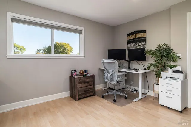 a view of backyard with wooden floor