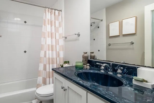 a view of a swimming pool with an outdoor space and seating area