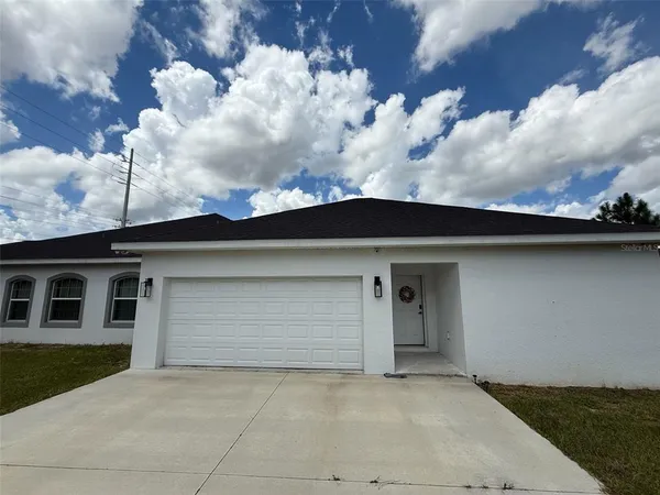a view of backyard of house