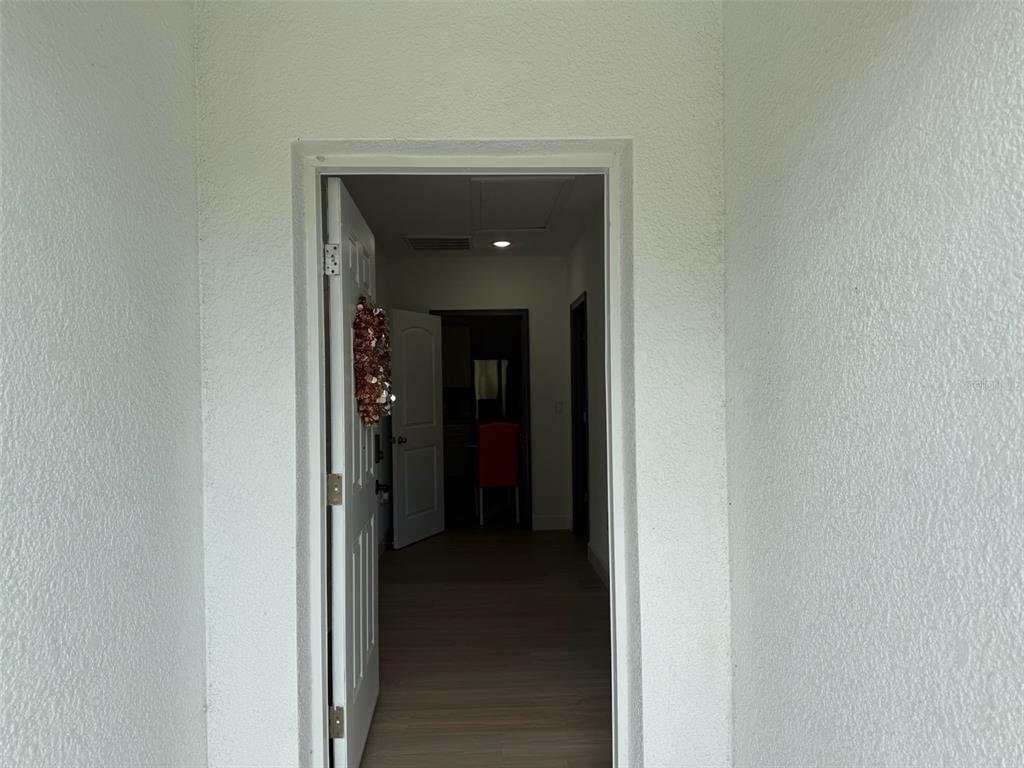 2050 Florida Development Road, Unit B Davenport, FL 33837 - Photo 2 of 16 a view of a hallway with hallway