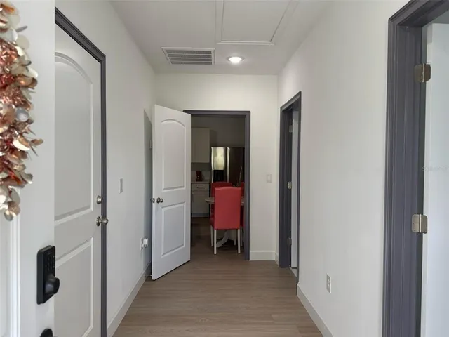 a view of a room with a furniture and closet