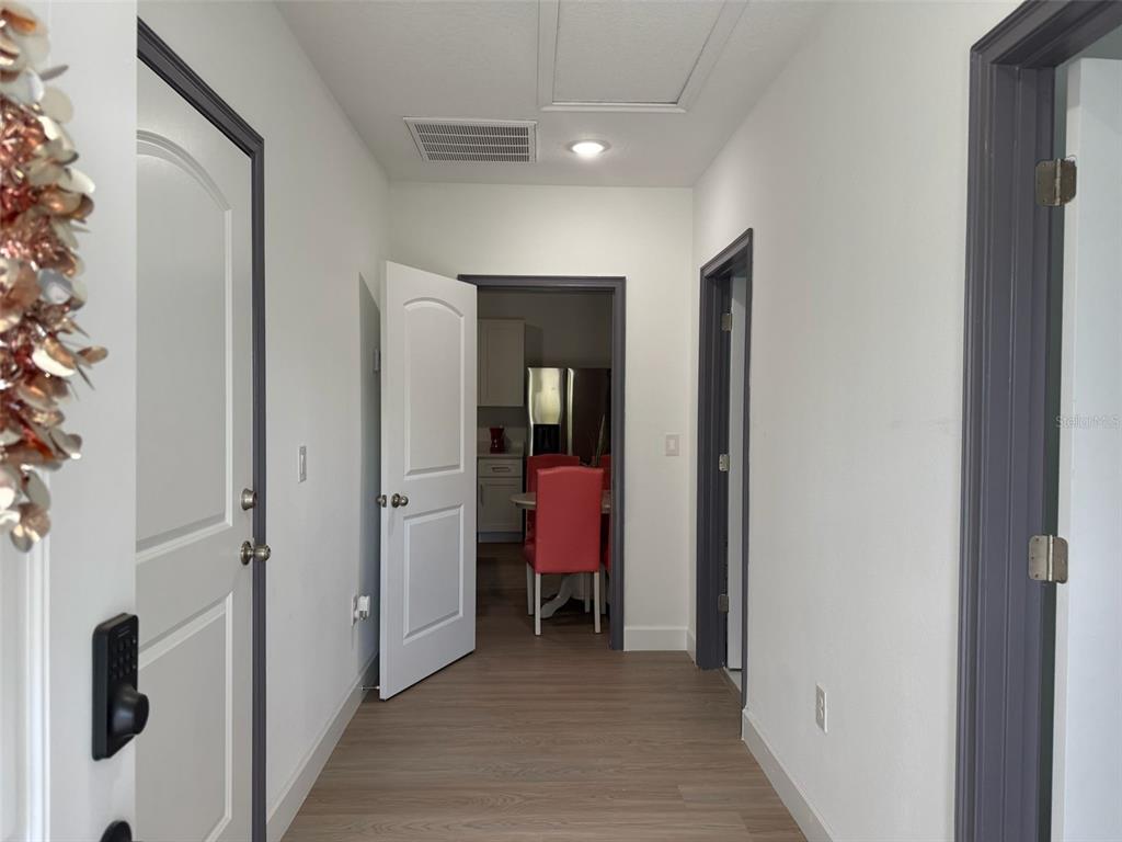 2050 Florida Development Road, Unit B Davenport, FL 33837 - Photo 3 of 16 a view of a room with a furniture and closet