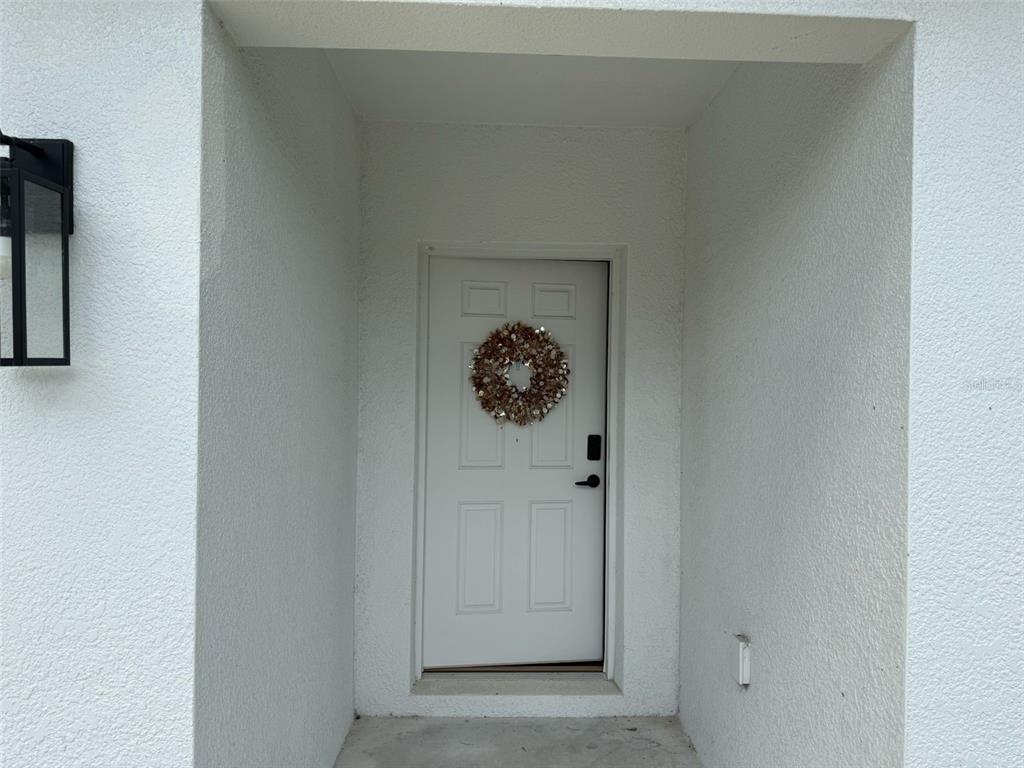 2050 Florida Development Road, Unit B Davenport, FL 33837 - Photo 6 of 16 a view of front door