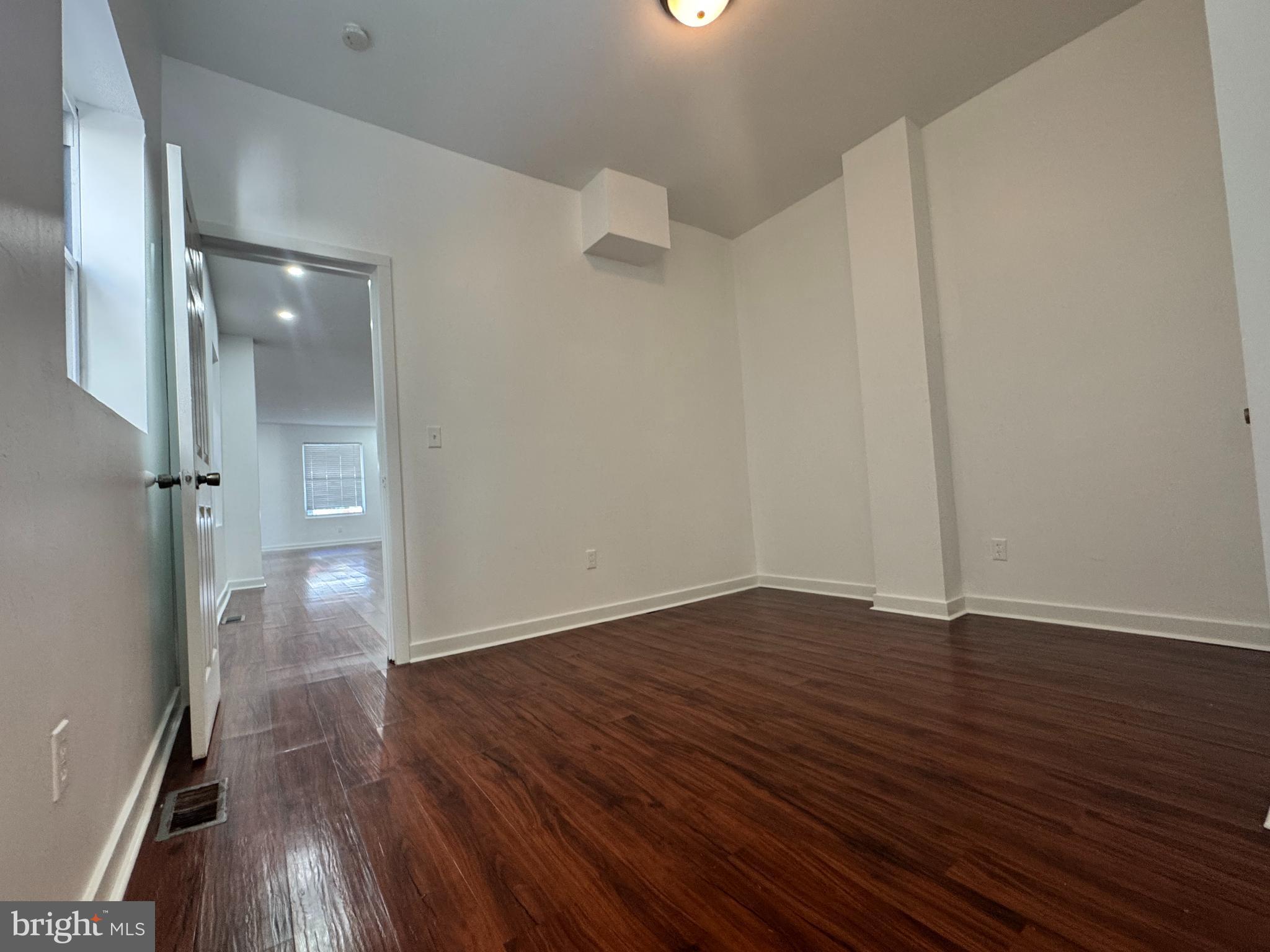 126 North Paxon Street Philadelphia, PA 19139 - Photo 14 of 38 wooden floor in an empty room