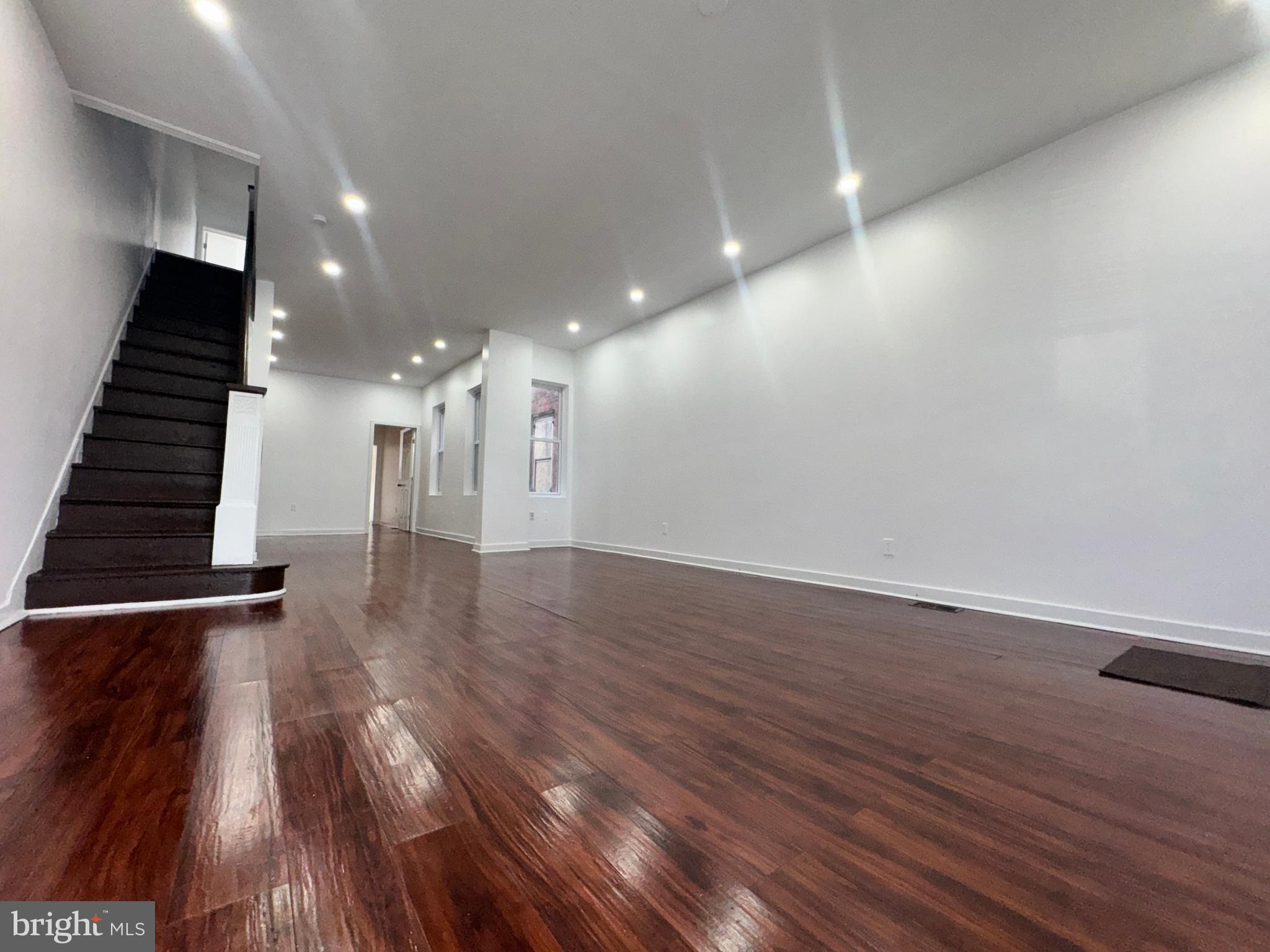 126 North Paxon Street Philadelphia, PA 19139 - Photo 7 of 38 a view of gallery with wooden floor