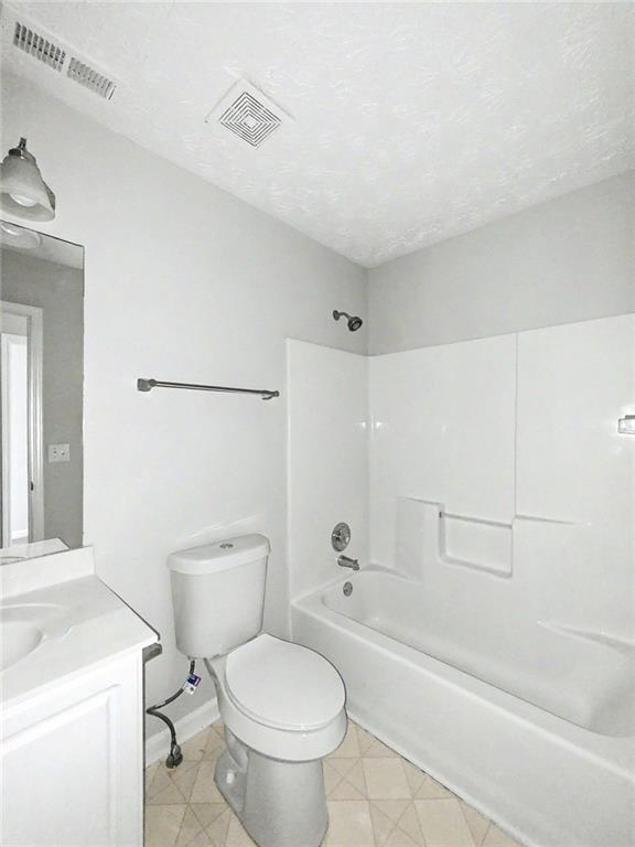 48 Savanna Court Powder Springs, GA 30127 - Photo 25 of 28 a bathroom with a sink a toilet and a bathtub