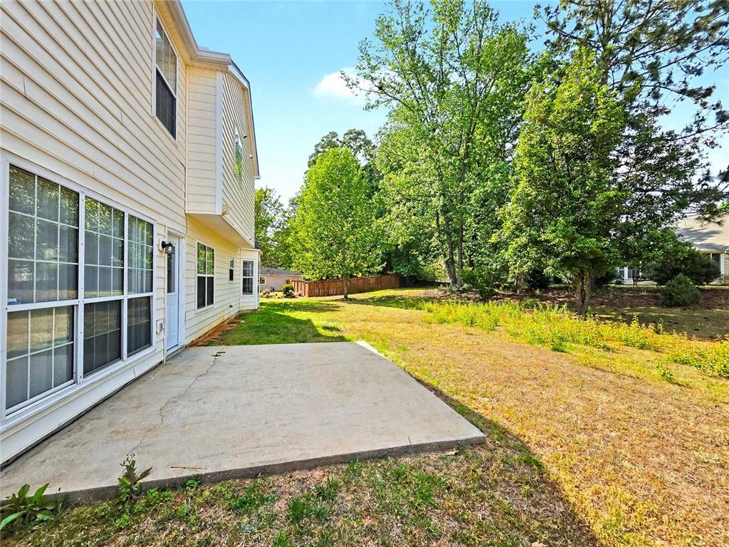 48 Savanna Court Powder Springs, GA 30127 - Photo 27 of 28 a view of swimming pool with an outdoor space