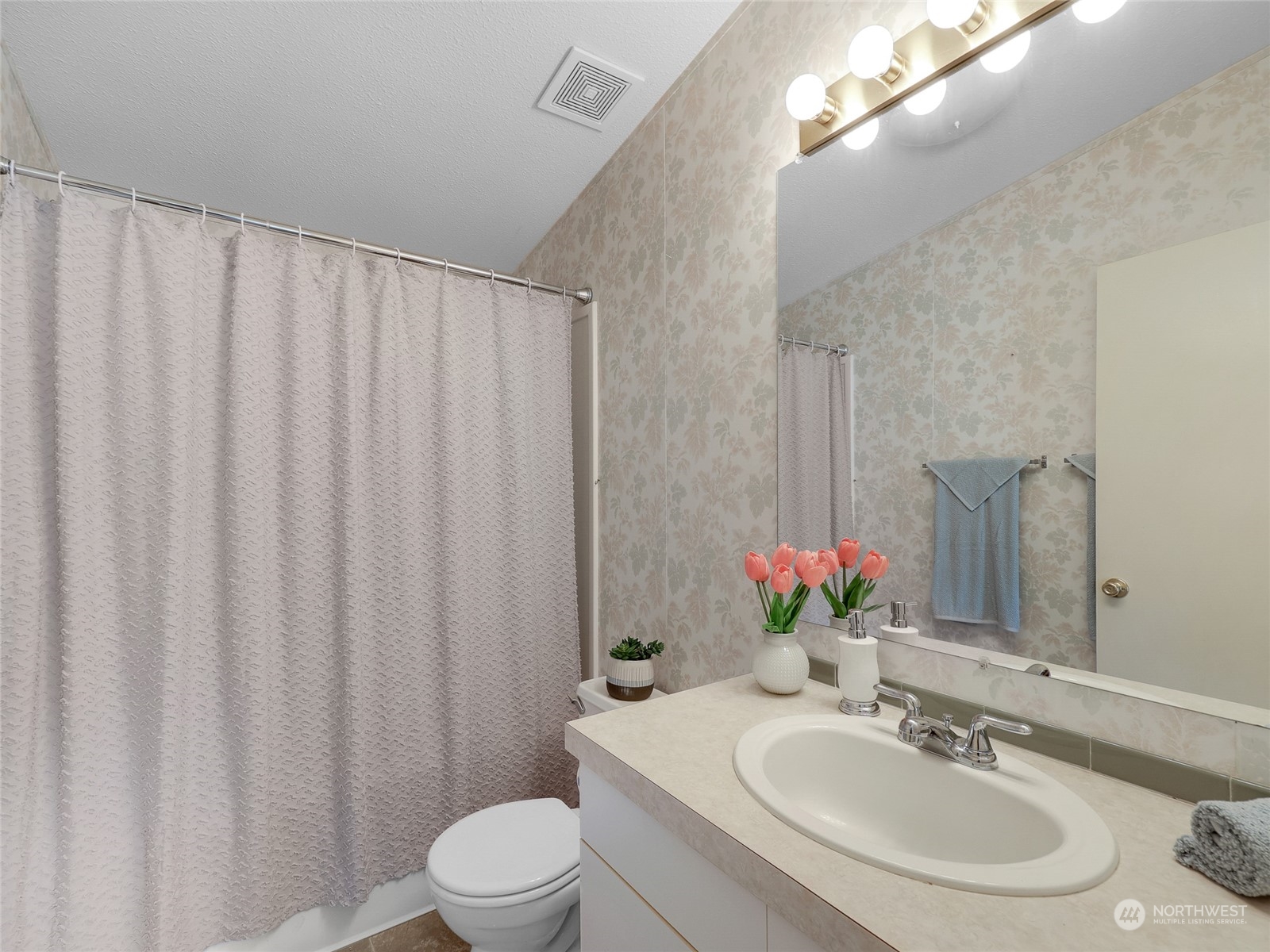 30511 Stackpole Lane Ocean Park, WA 98640 - Photo 22 of 40 a bathroom with a sink toilet and shower