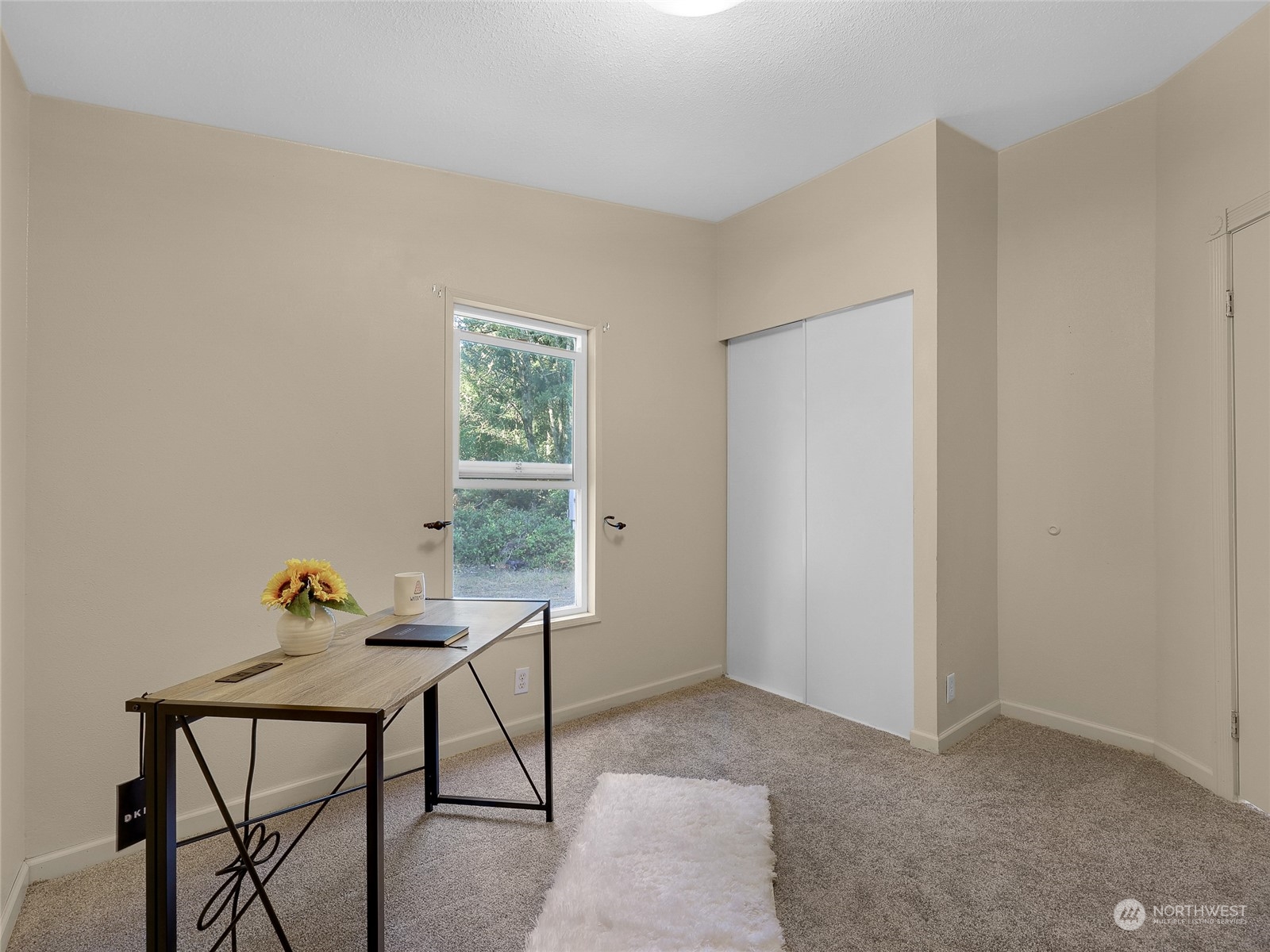 30511 Stackpole Lane Ocean Park, WA 98640 - Photo 24 of 40 a living room with furniture and windows