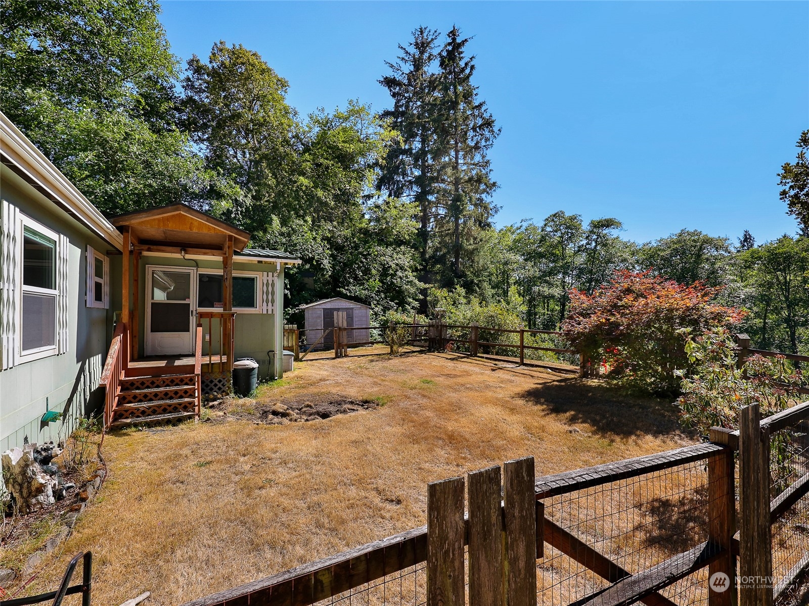 30511 Stackpole Lane Ocean Park, WA 98640 - Photo 28 of 40 a view of house with backyard and furniture