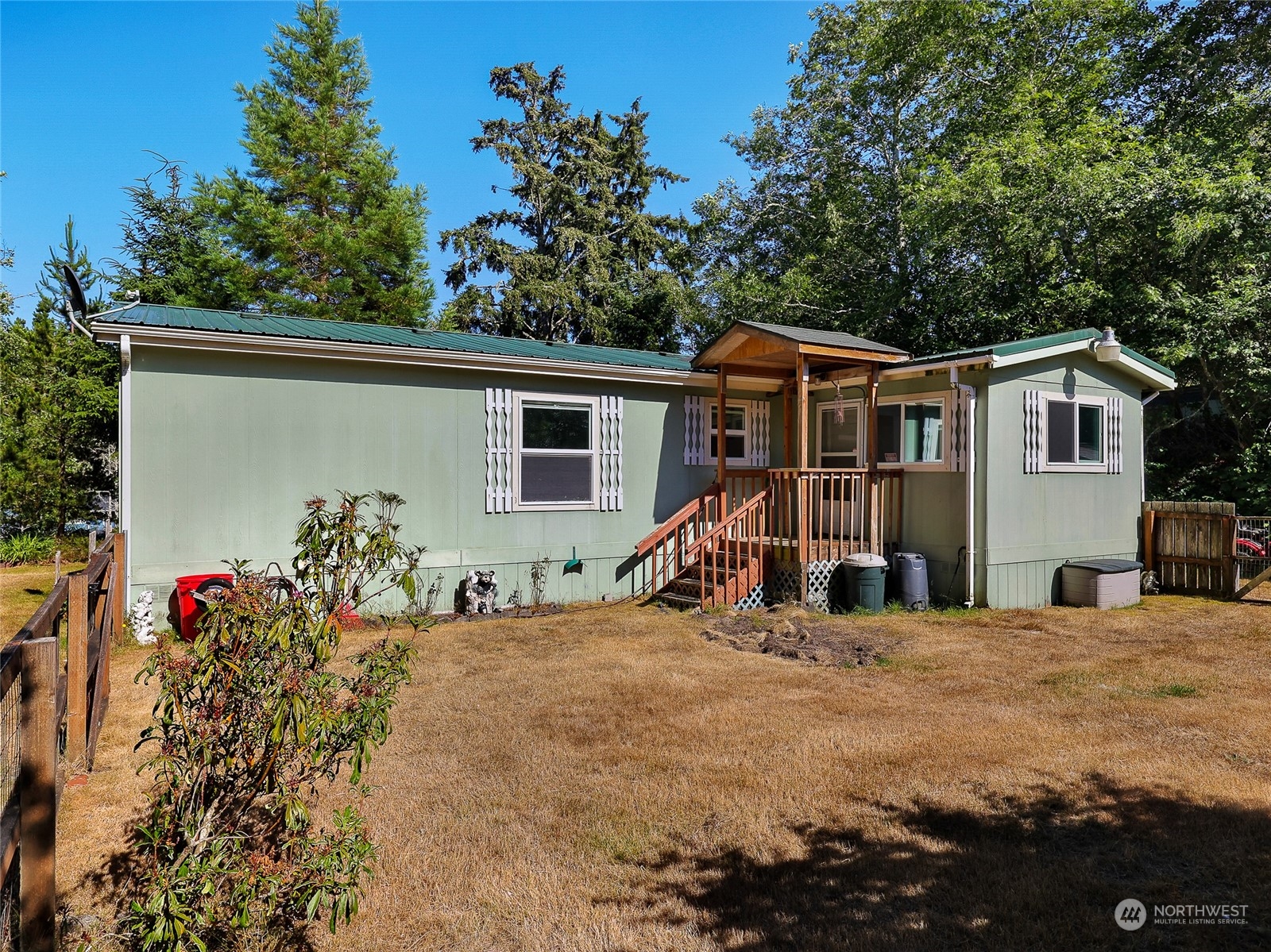 30511 Stackpole Lane Ocean Park, WA 98640 - Photo 29 of 40 a view of a house with a patio