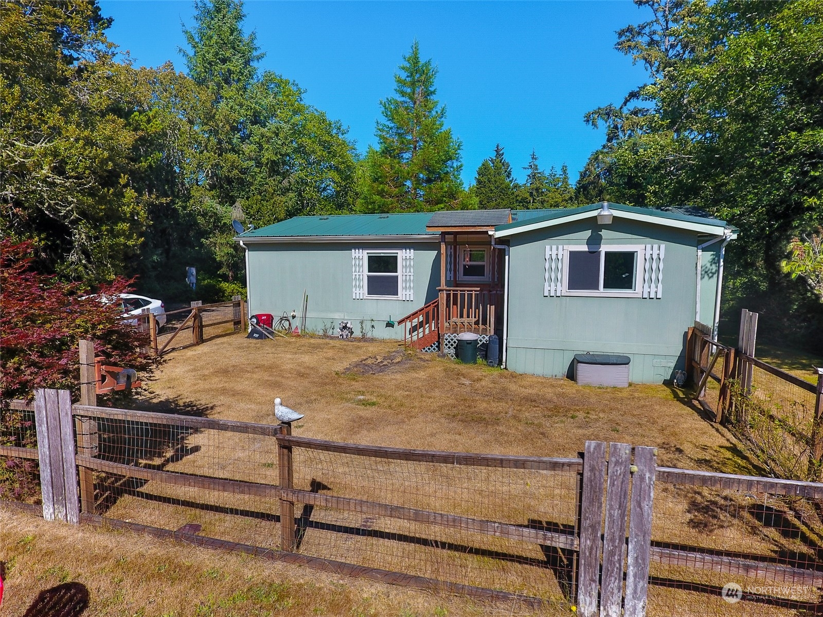 30511 Stackpole Lane Ocean Park, WA 98640 - Photo 30 of 40 a view of backyard with a patio and outdoor seating