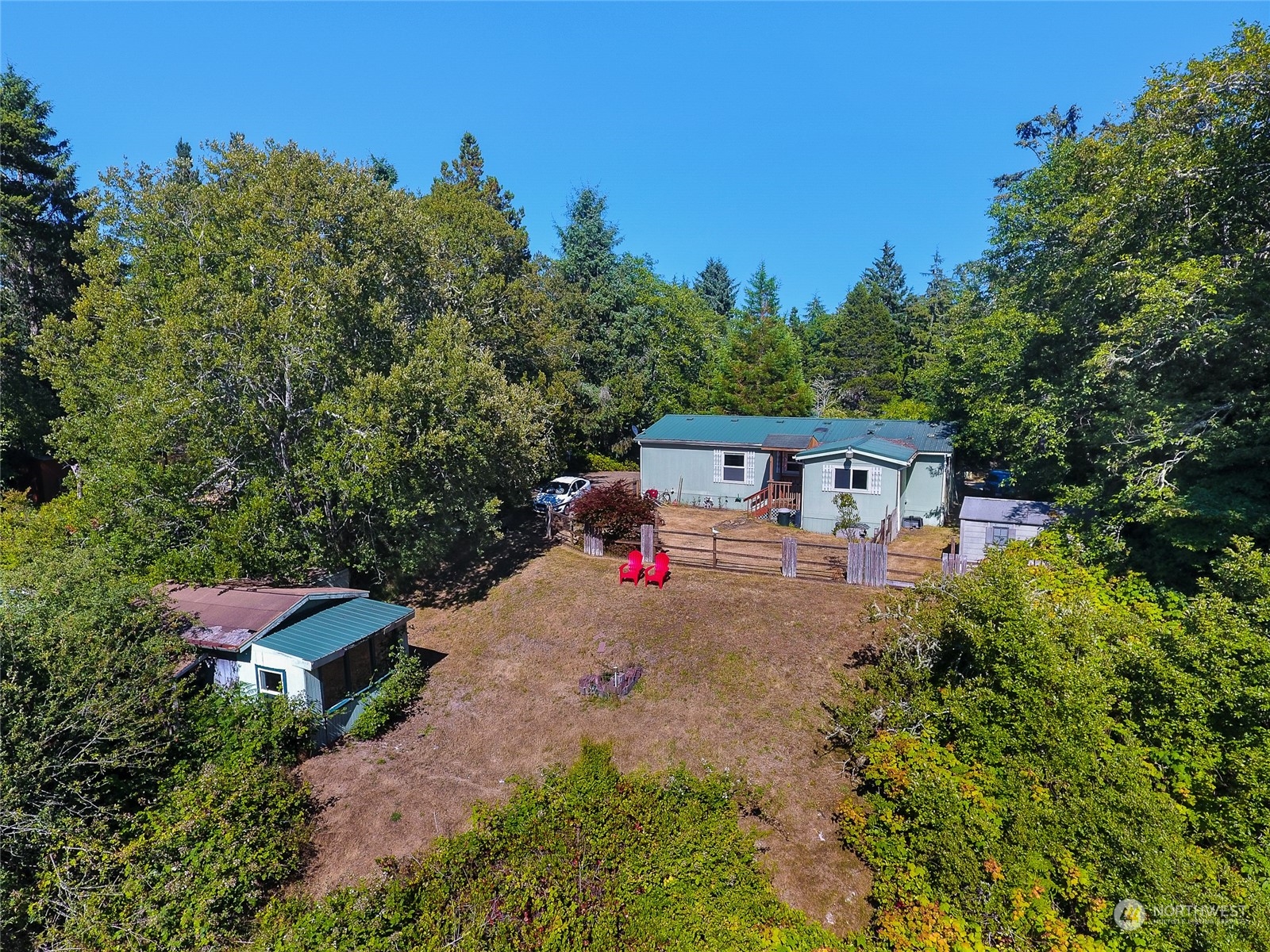 30511 Stackpole Lane Ocean Park, WA 98640 - Photo 32 of 40 an aerial view of a house with yard and outdoor seating