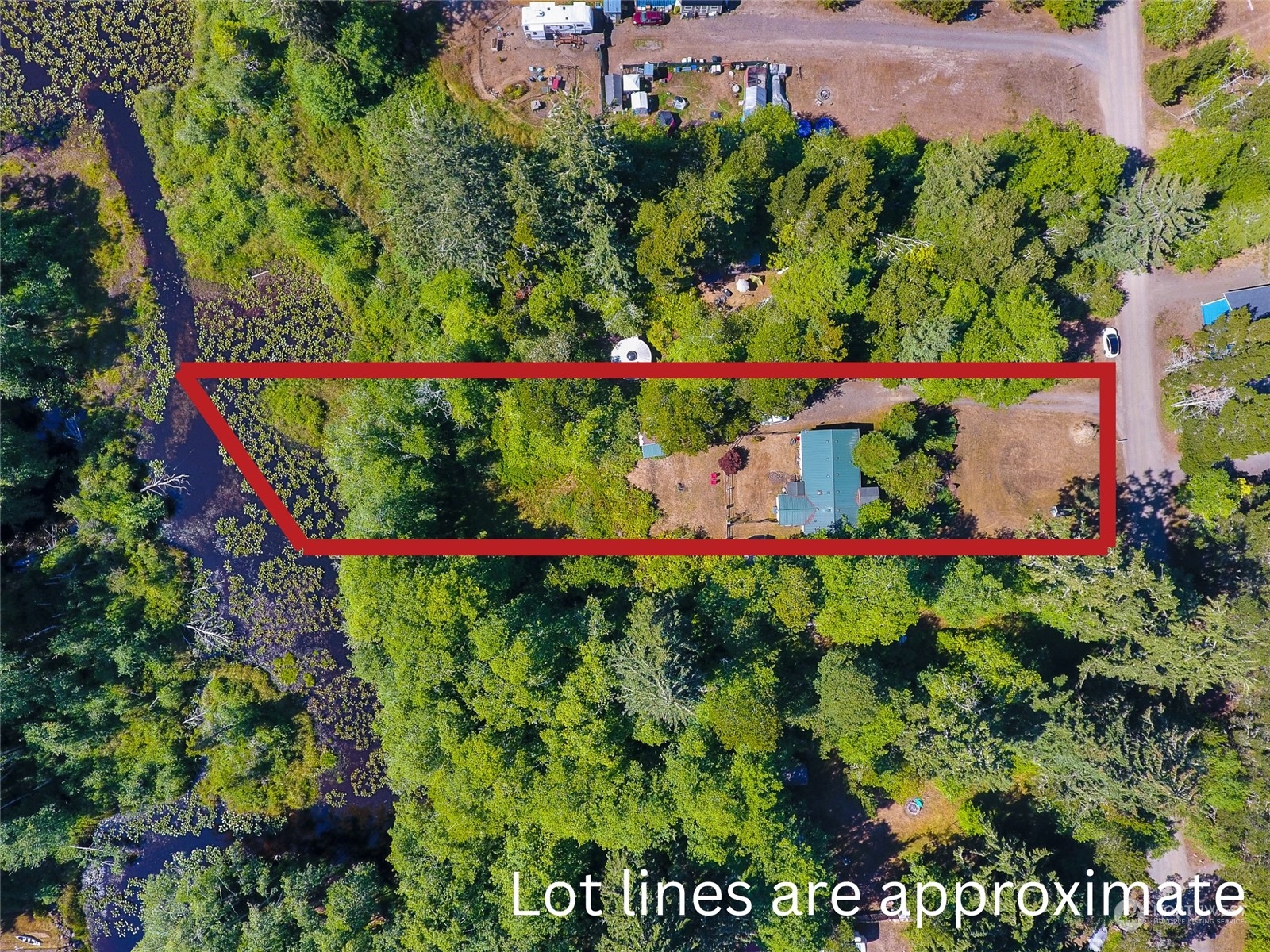 30511 Stackpole Lane Ocean Park, WA 98640 - Photo 4 of 40 a view of a flower garden in front of a house