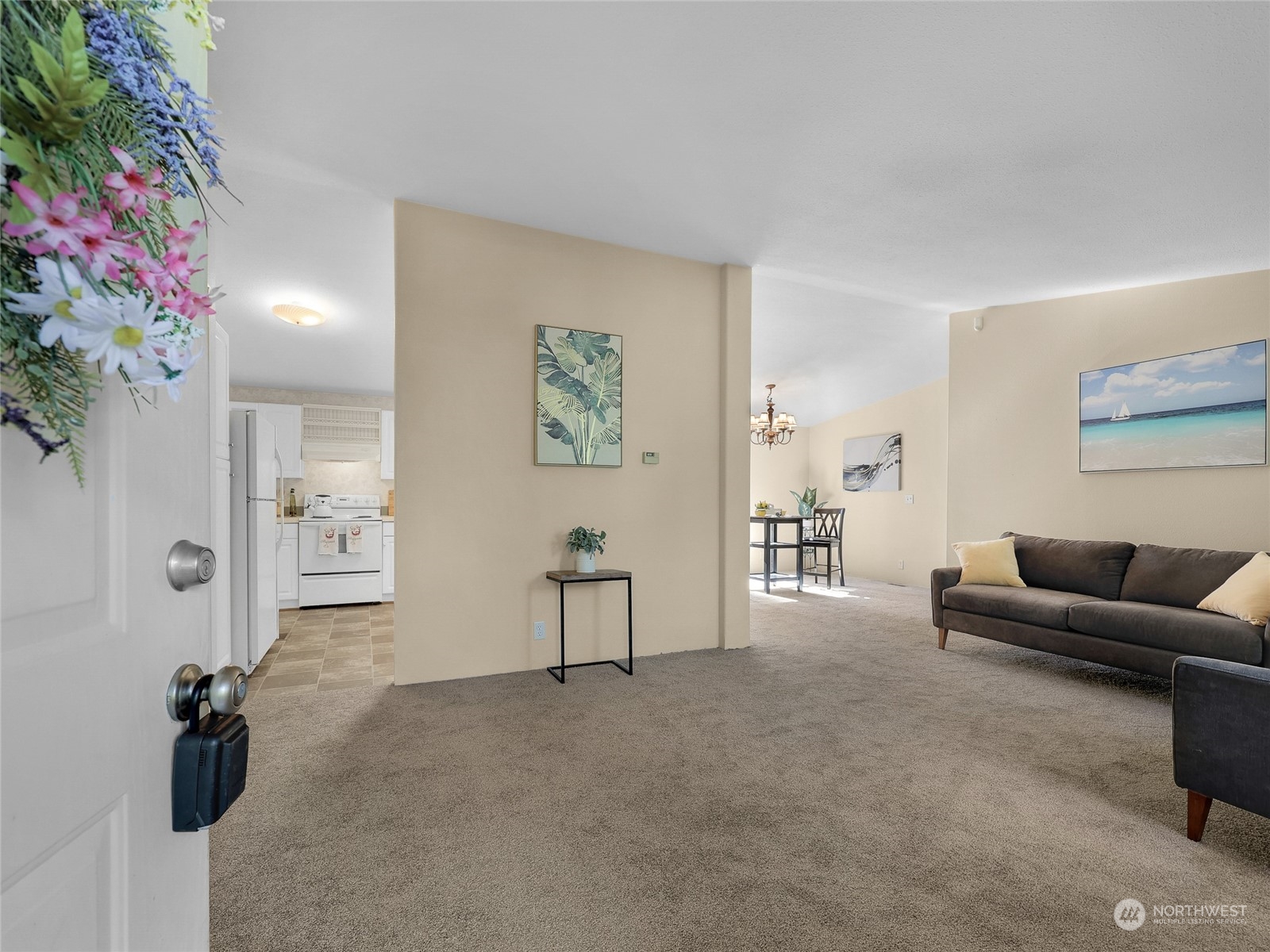30511 Stackpole Lane Ocean Park, WA 98640 - Photo 5 of 40 a living room with furniture and a potted plant