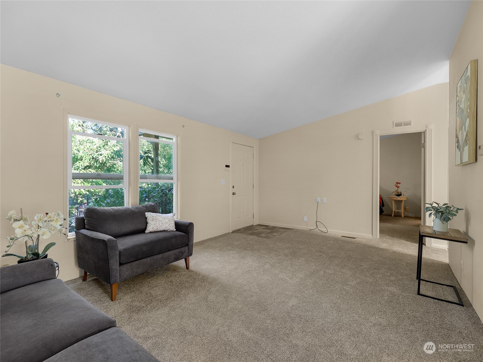 30511 Stackpole Lane Ocean Park, WA 98640 - Photo 7 of 40 a living room with furniture and a large window