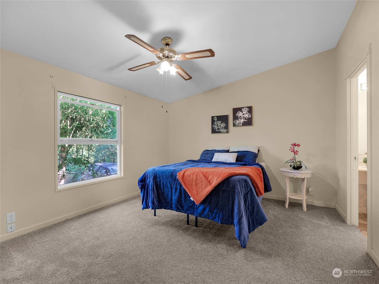 30511 Stackpole Lane Ocean Park, WA 98640 - Photo 8 of 40 a spacious bedroom with a bed and window