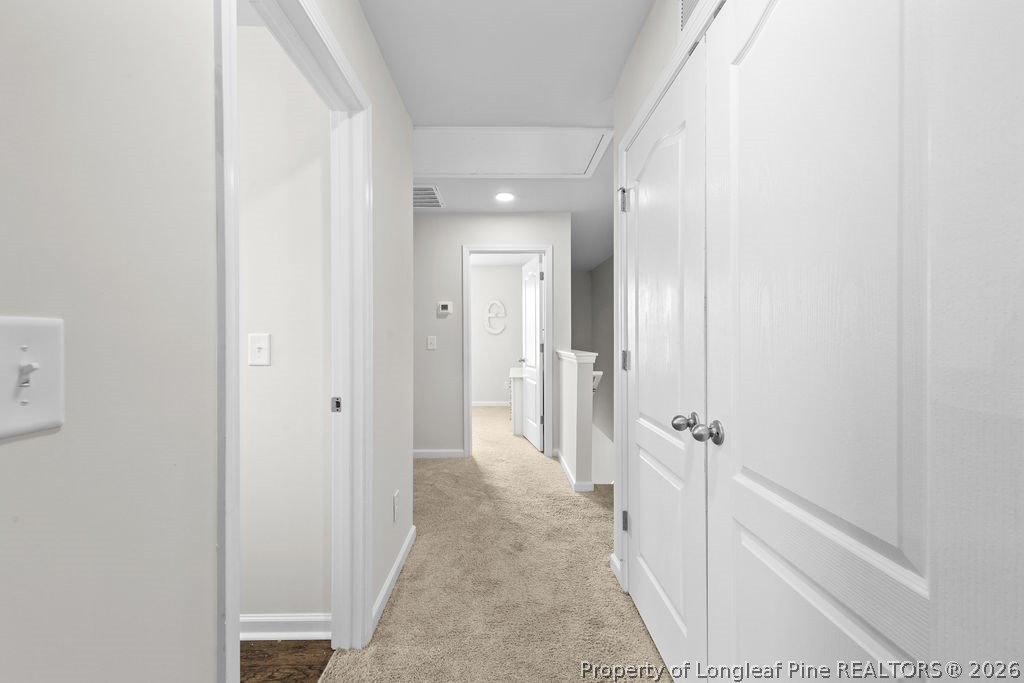81 Merlin Court Godwin, NC 28344 - Photo 28 of 34 a view of a hallway with a shower