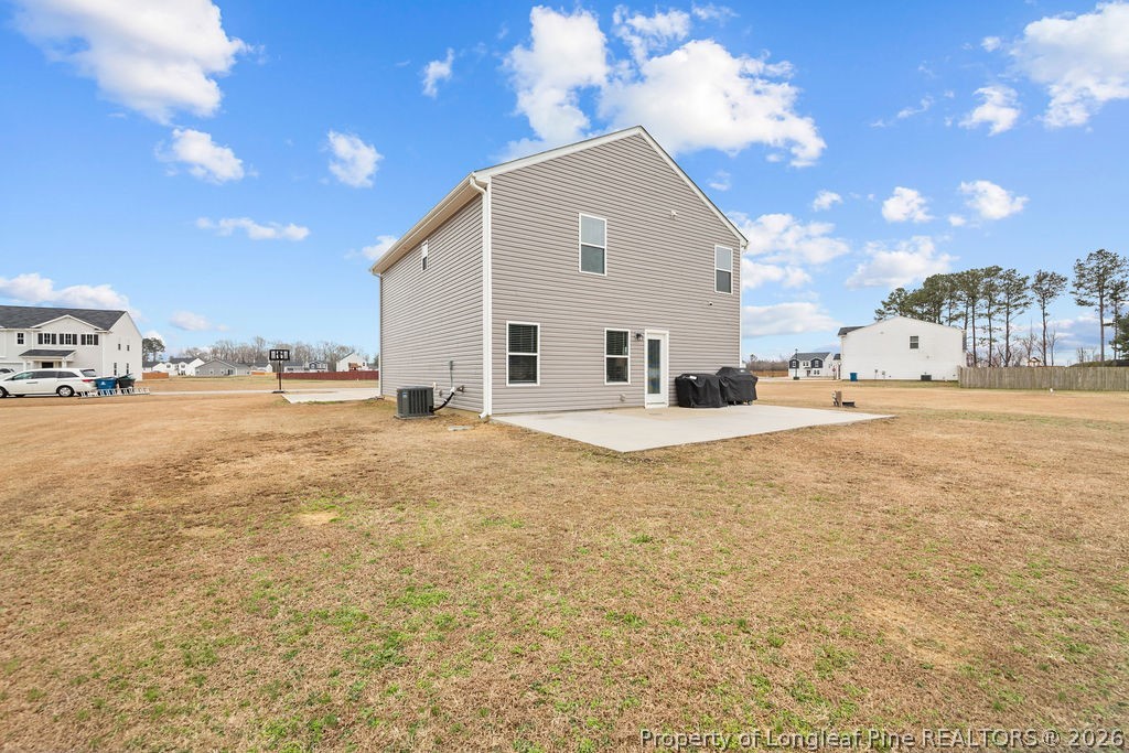 81 Merlin Court Godwin, NC 28344 - Photo 32 of 34 a view of a house with a yard