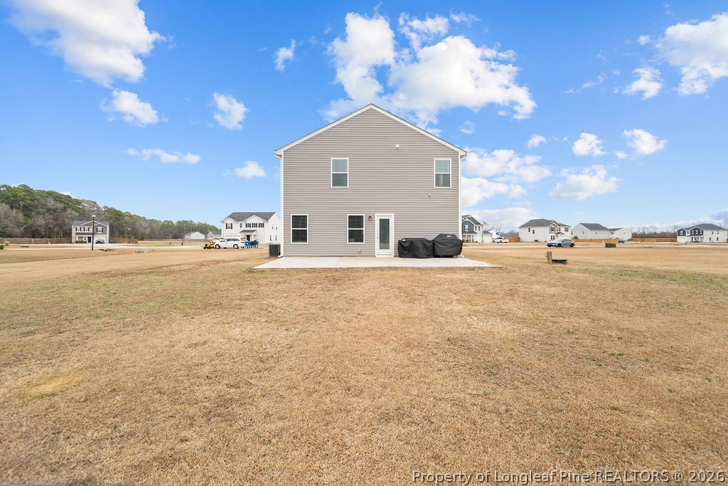 81 Merlin Court Godwin, NC 28344 - Photo 33 of 34 a view of a house with outdoor space and sitting area