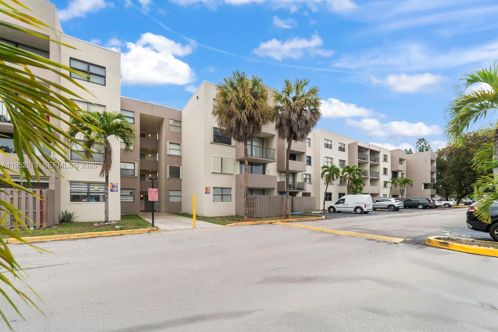 8002 Southwest 149th Avenue, Unit B118 Miami, FL 33193 - Photo 22 of 23 a view of a street with houses