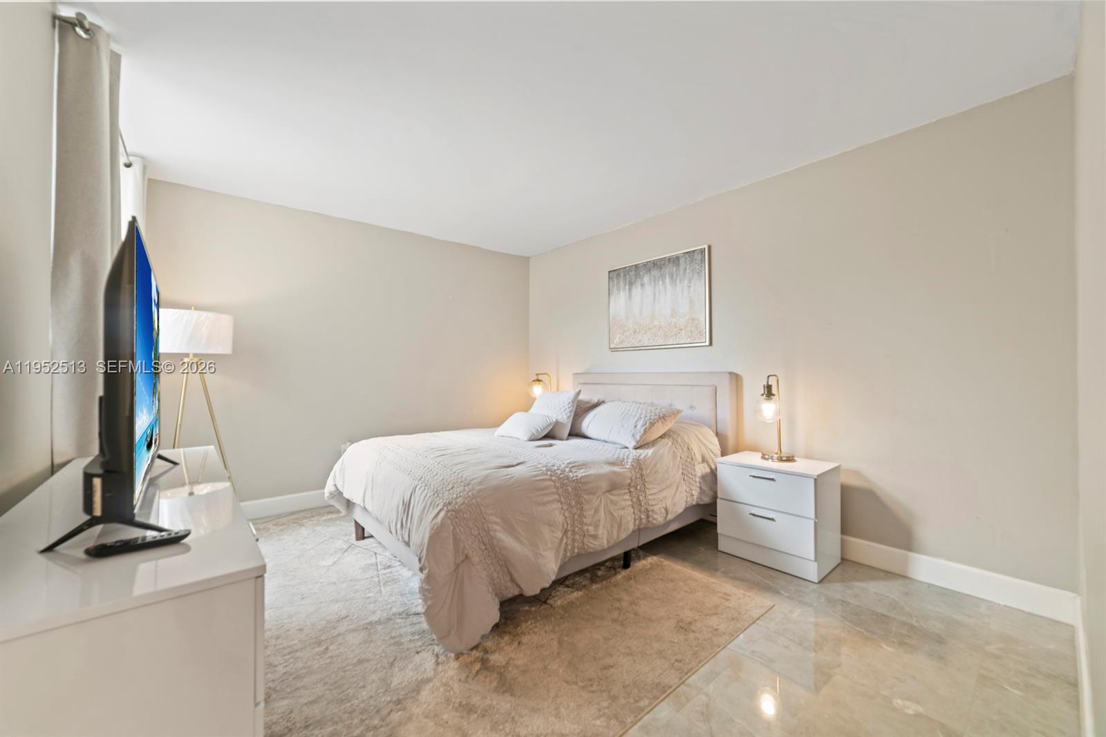 8002 Southwest 149th Avenue, Unit B118 Miami, FL 33193 - Photo 5 of 23 a bedroom with bed and a window