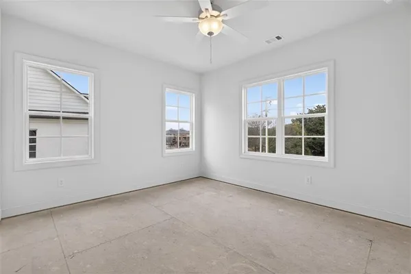 an empty room with windows