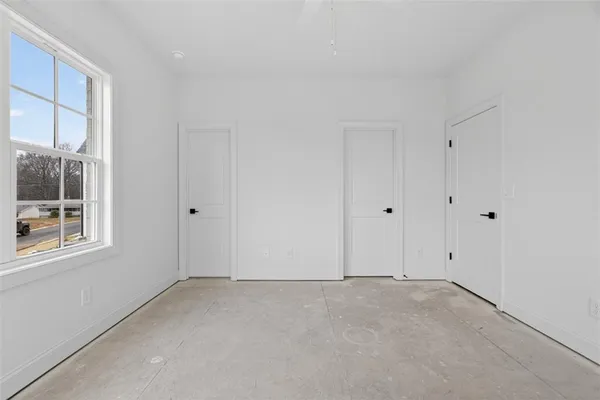 an empty room with windows