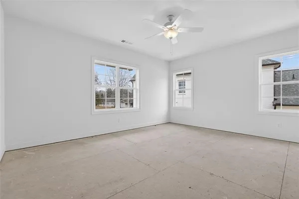 a bathroom with a sink vanity tub and a mirror
