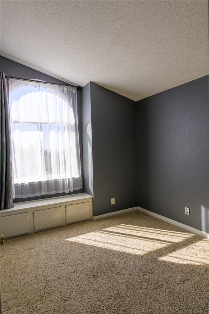1202 Villanova Place Riverside, CA 92506 - Photo 32 of 59 a view of an empty room with a window