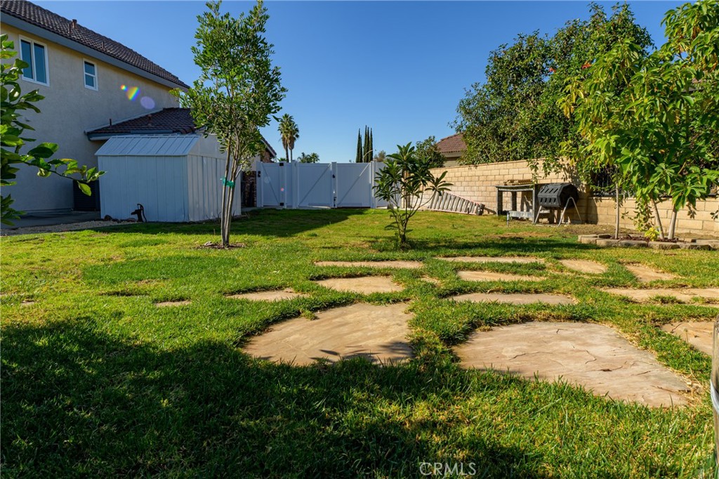 1202 Villanova Place Riverside, CA 92506 - Photo 51 of 59 a view of a house with a yard and tree s