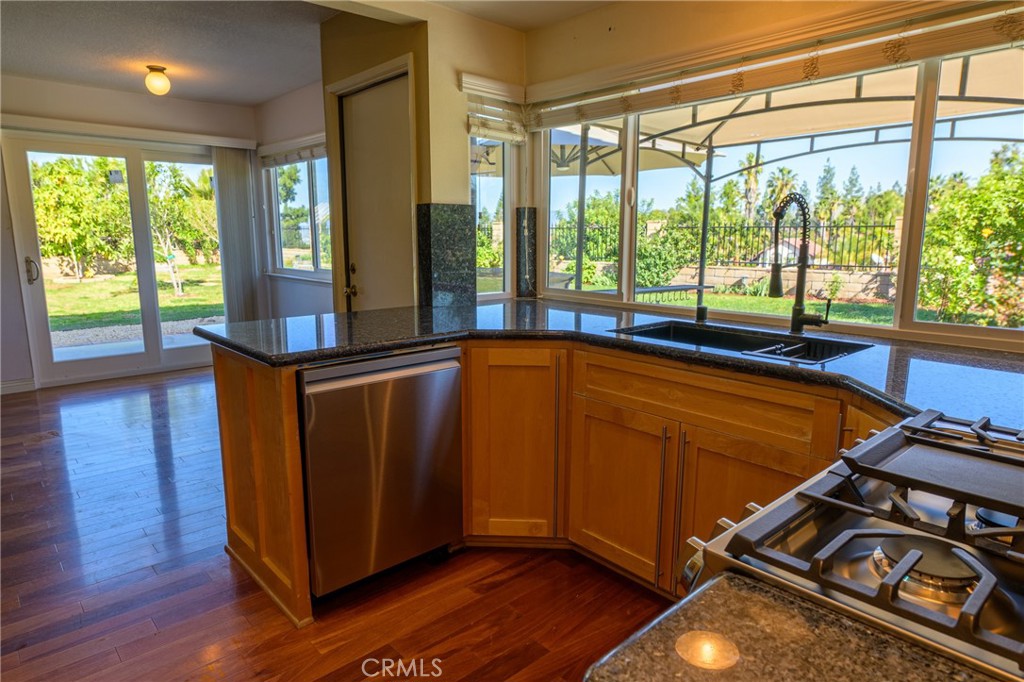 1202 Villanova Place Riverside, CA 92506 - Photo 9 of 59 a view of a room with wooden floor and a window