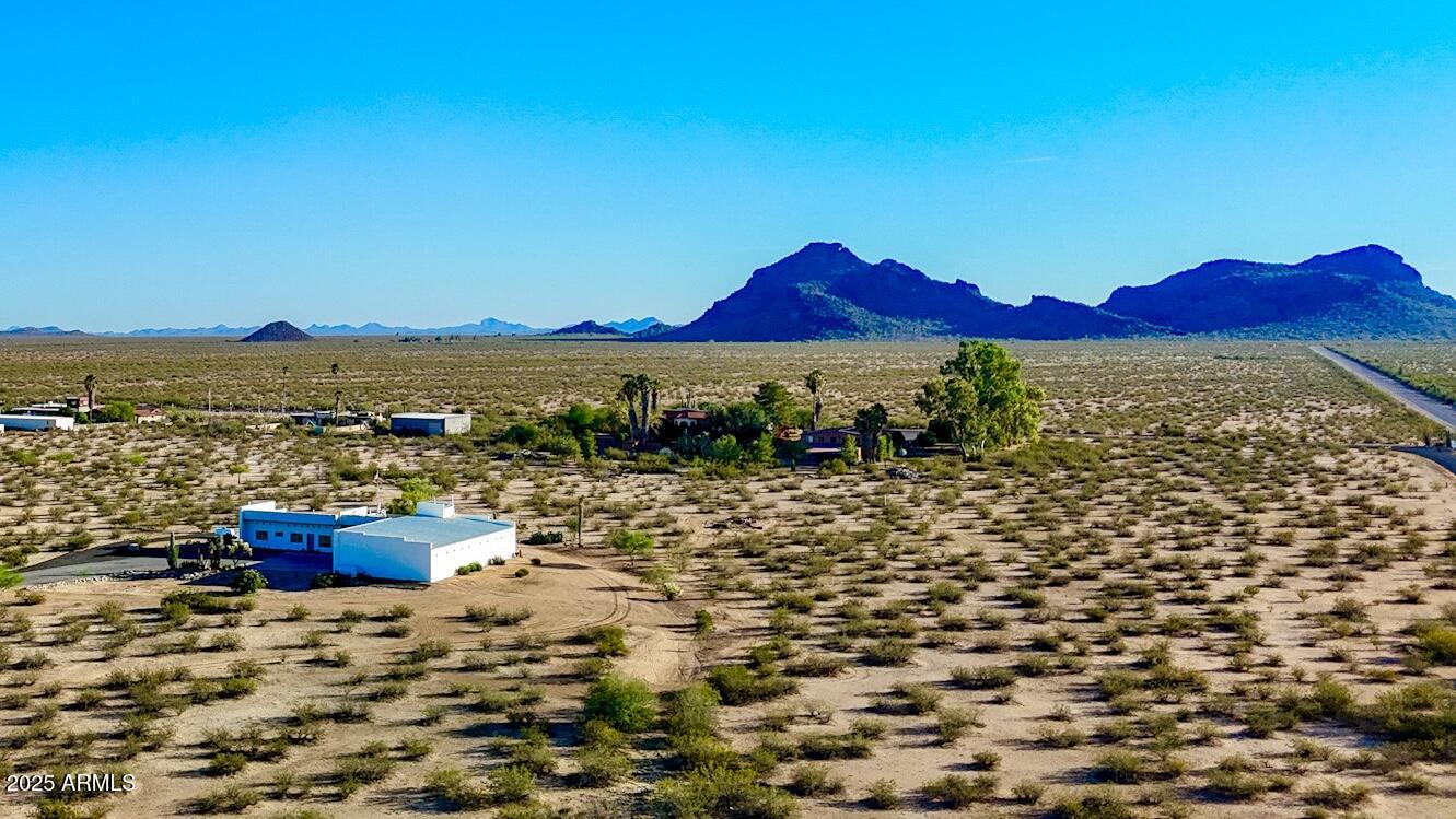0 West Williams Road Aguila, AZ 85320 - Photo 21 of 21 a view of a lake with a mountain in the background