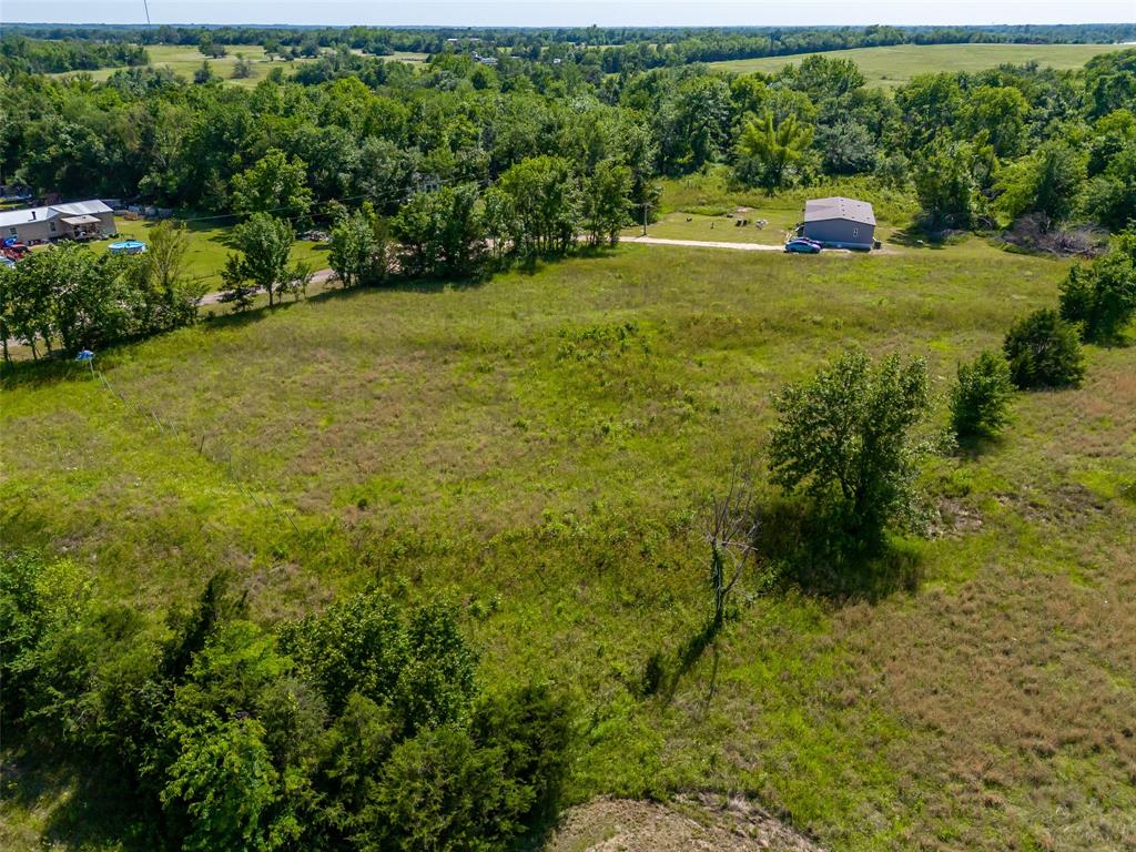 23070 County Road Powderly, TX 75473 - Photo 35 of 35 a childrens park with large trees