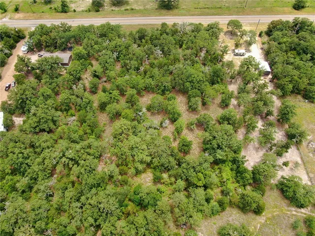a view of a yard with an outdoor space