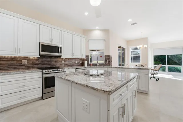 a bedroom with bed and a window