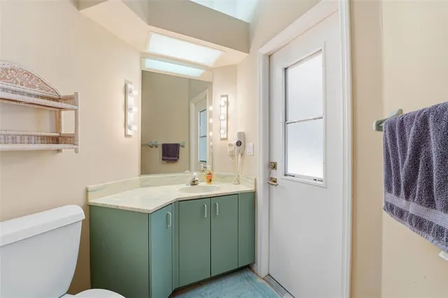 a view of a livingroom with furniture and window