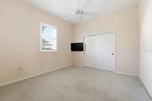 an aerial view of a house with garden space and outdoor seating