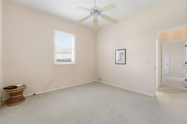 an aerial view of residential building and lake