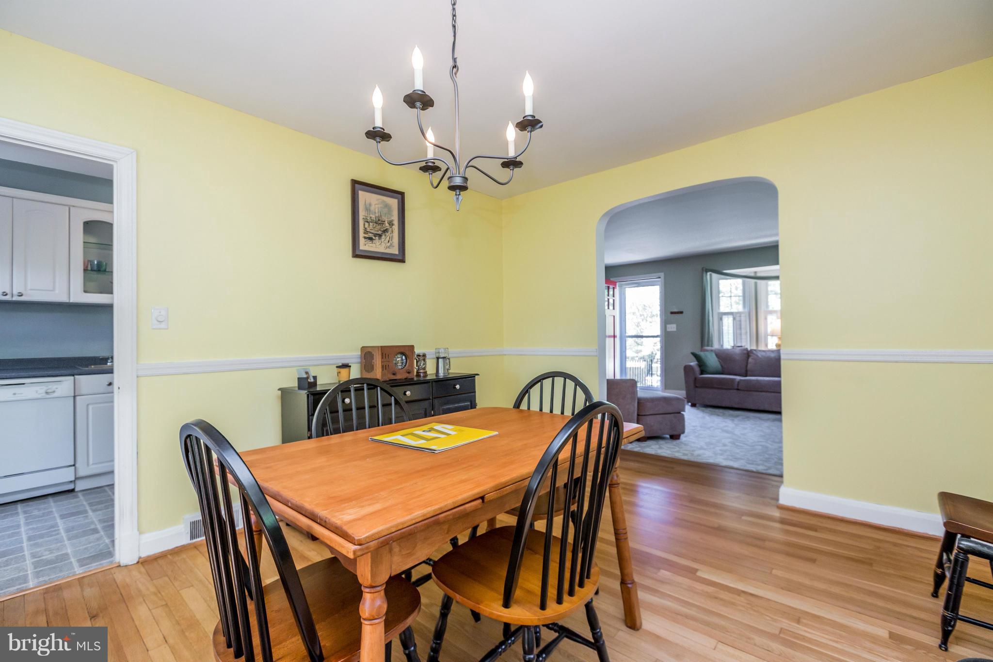 403 Overbrook Road Baltimore, MD 21212 - Photo 8 of 26 a view of a dining room with furniture and wooden floor