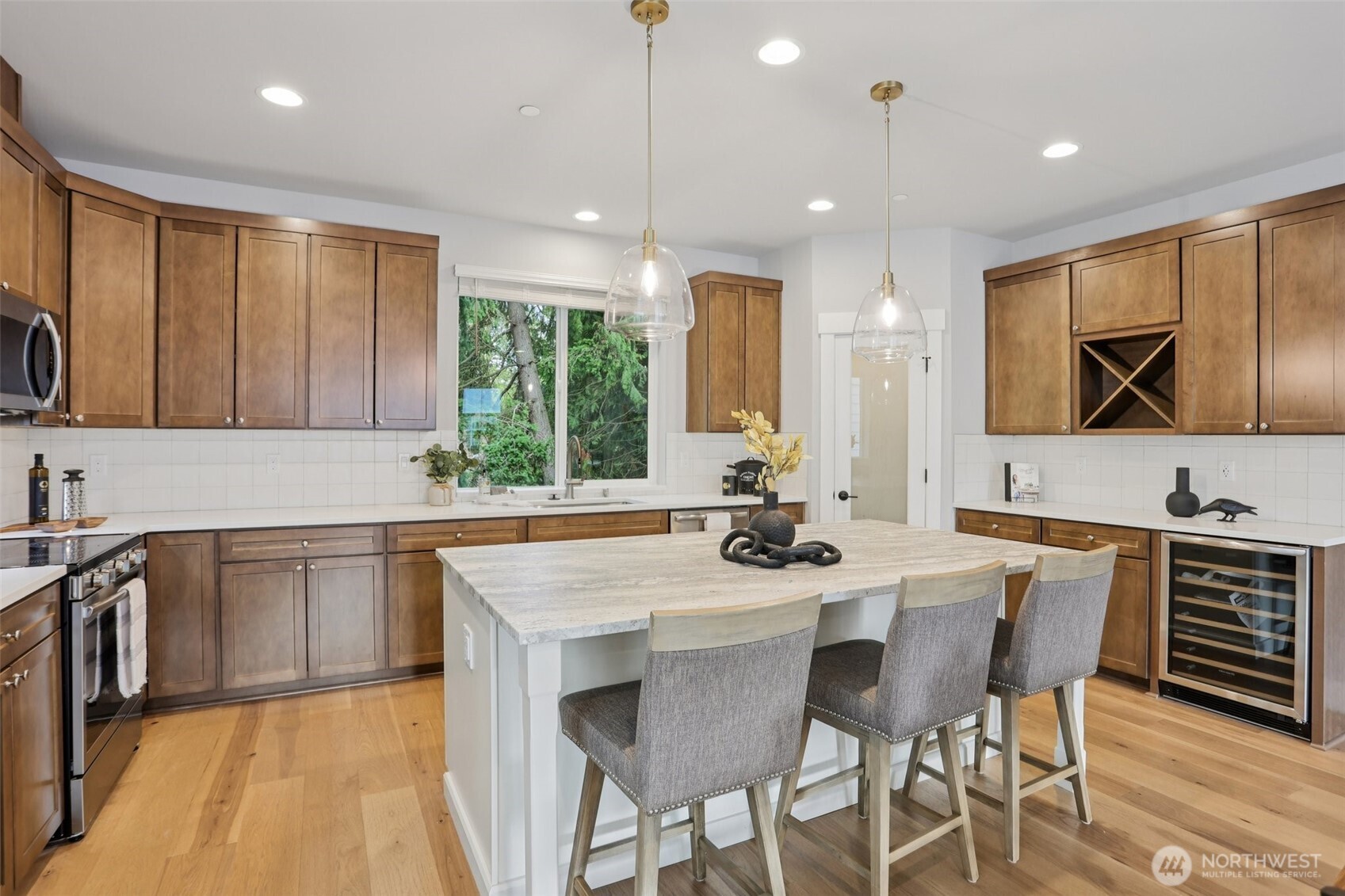 15 160th Place Southeast Bothell, WA 98012 - Photo 12 of 36 a kitchen with a sink cabinets and wooden floor