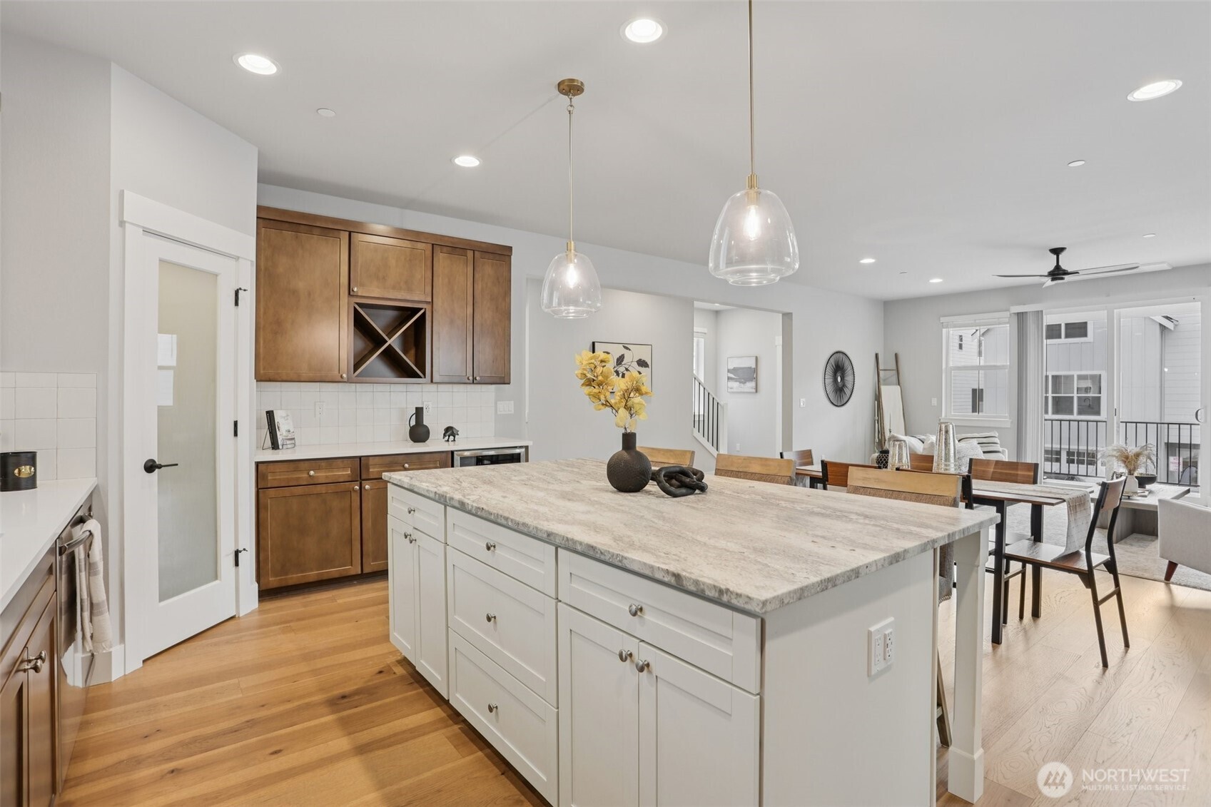 15 160th Place Southeast Bothell, WA 98012 - Photo 13 of 36 a kitchen with a sink a counter top space and living room view