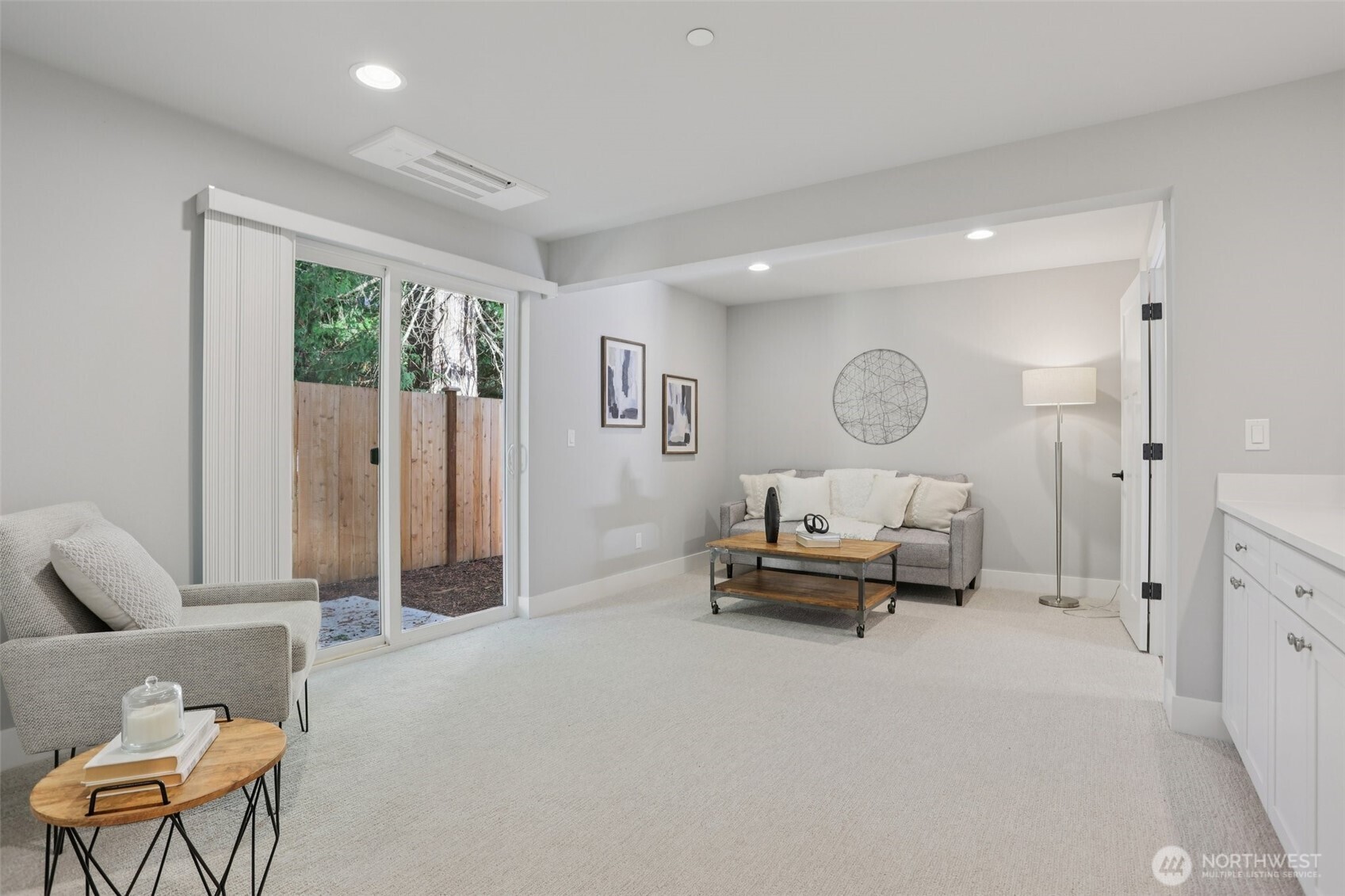 15 160th Place Southeast Bothell, WA 98012 - Photo 17 of 36 a living room with furniture and a large window