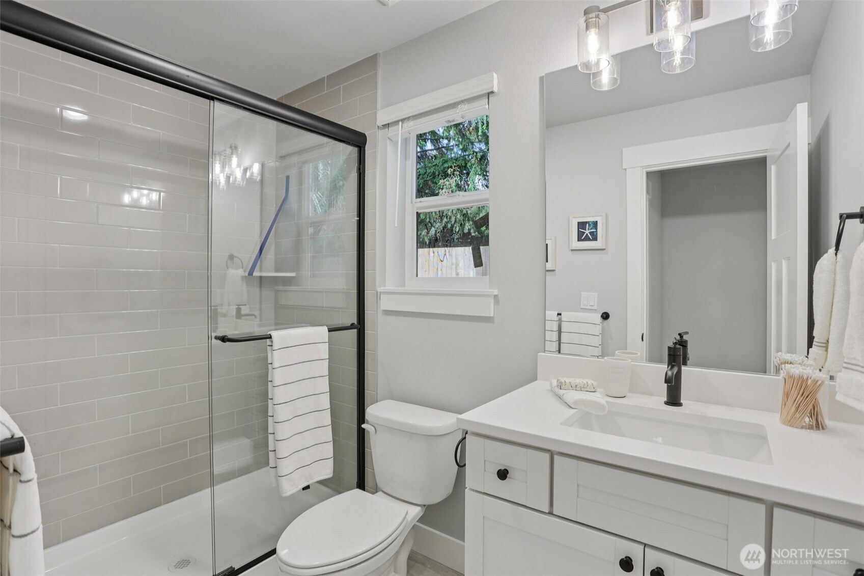 15 160th Place Southeast Bothell, WA 98012 - Photo 18 of 36 a bathroom with a sink a toilet and shower