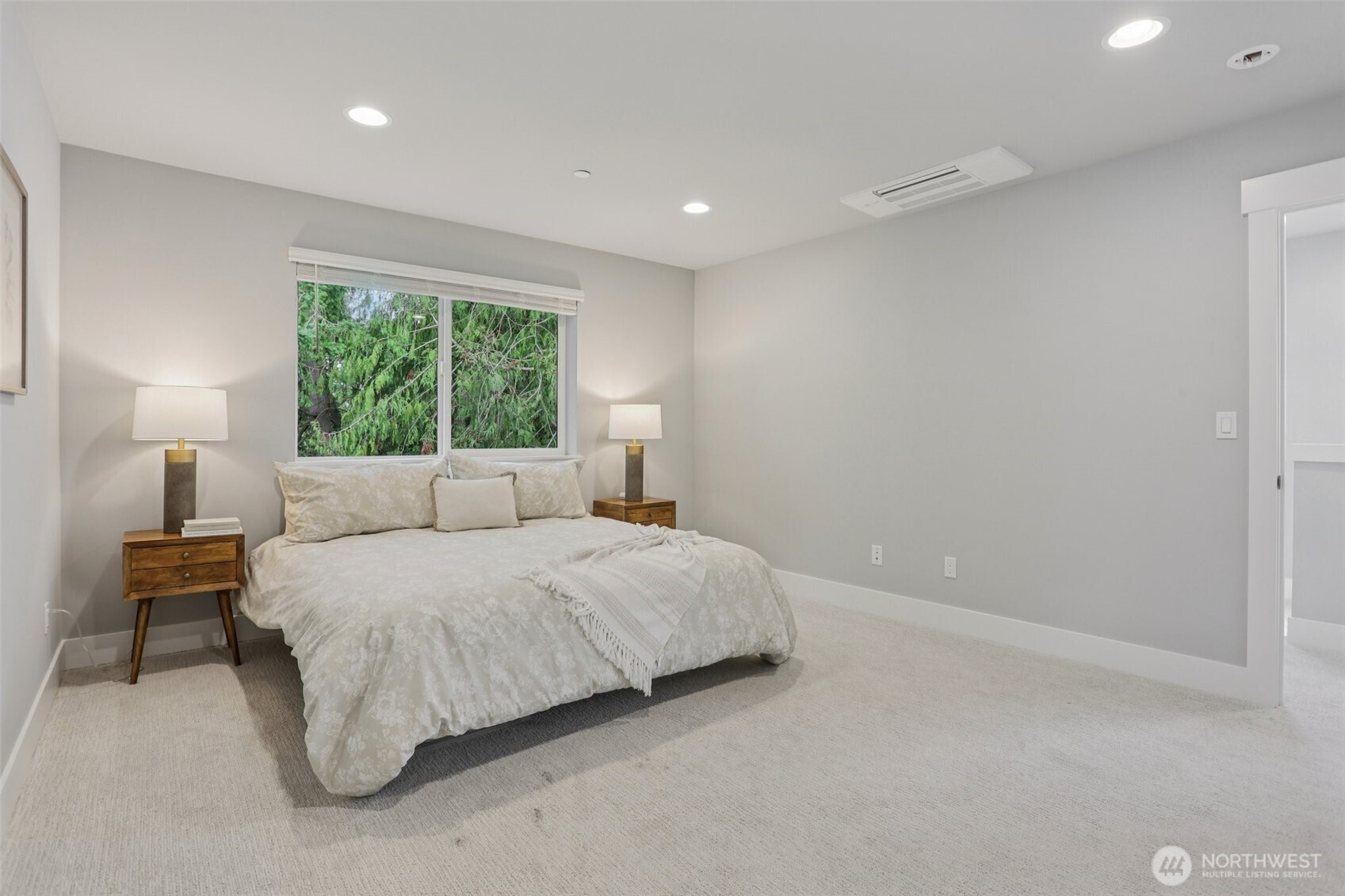 15 160th Place Southeast Bothell, WA 98012 - Photo 22 of 36 a bedroom with a bed and a lamp