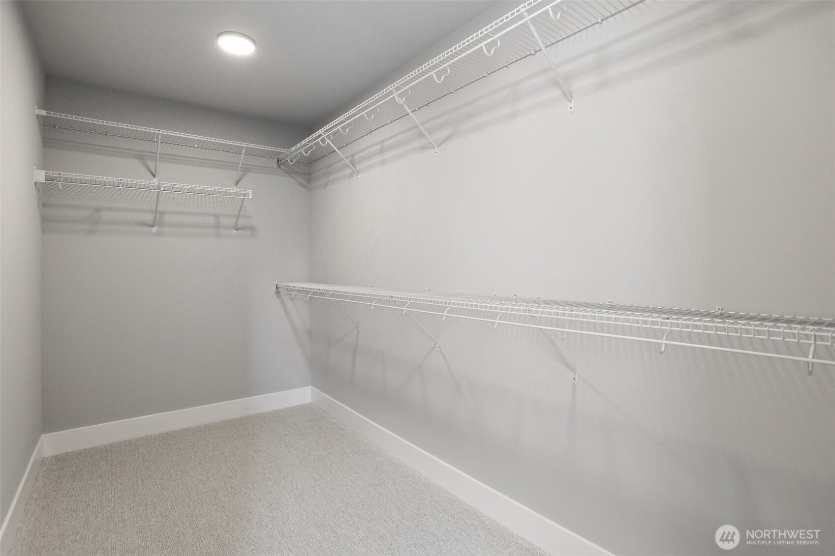 15 160th Place Southeast Bothell, WA 98012 - Photo 26 of 36 a view of a room with racks on the wall